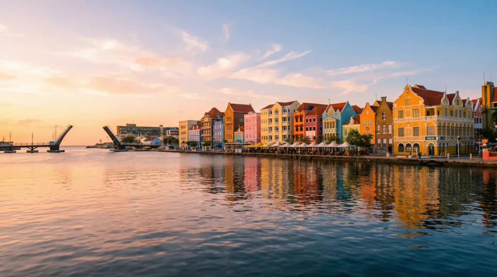 Colourful colonial buildings of Willemstad Curacao waterfront at golden hour
